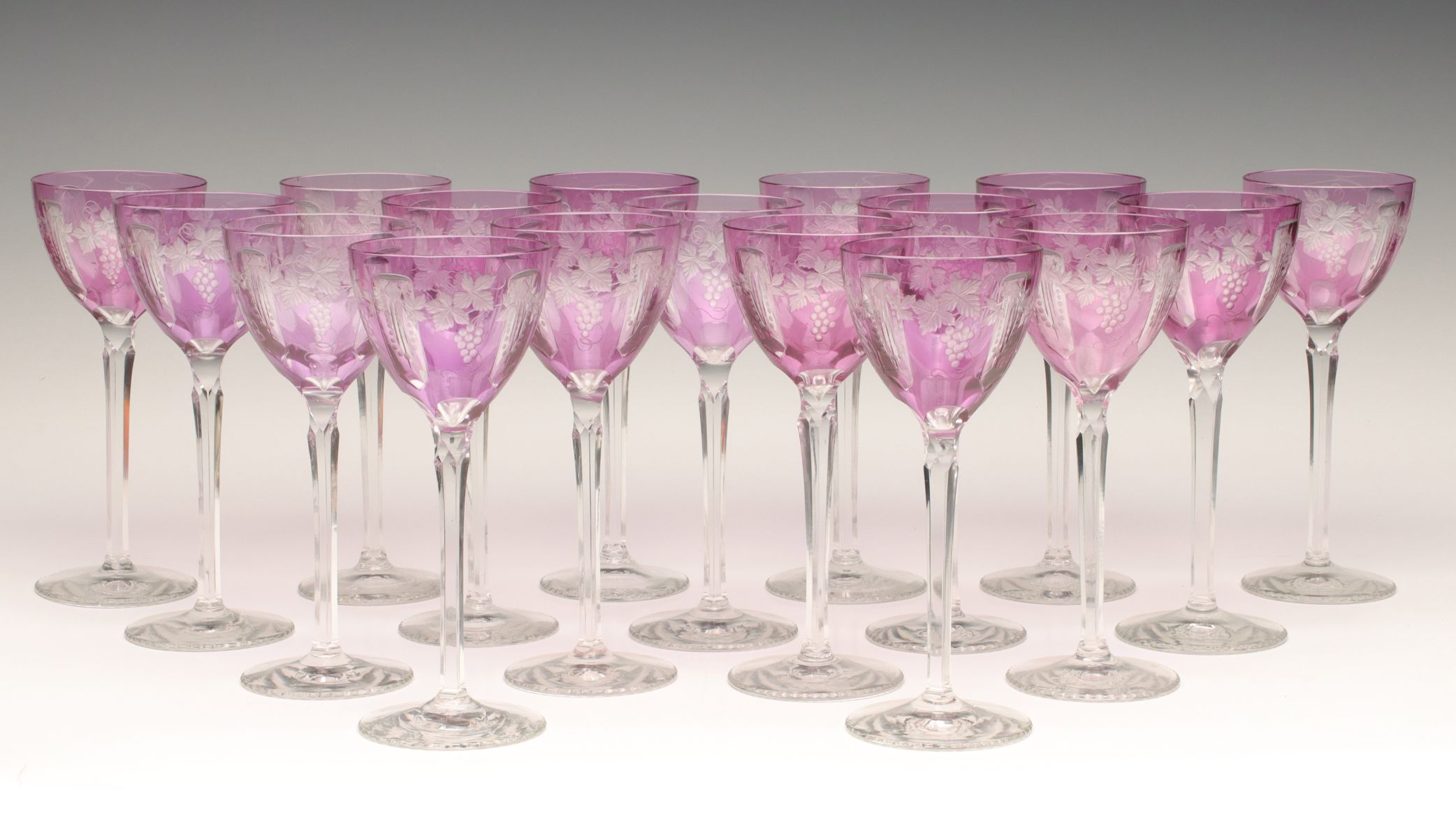 SEVENTEEN EARLY 20C. AMETHYST CUT TO CLEAR GOBLETS