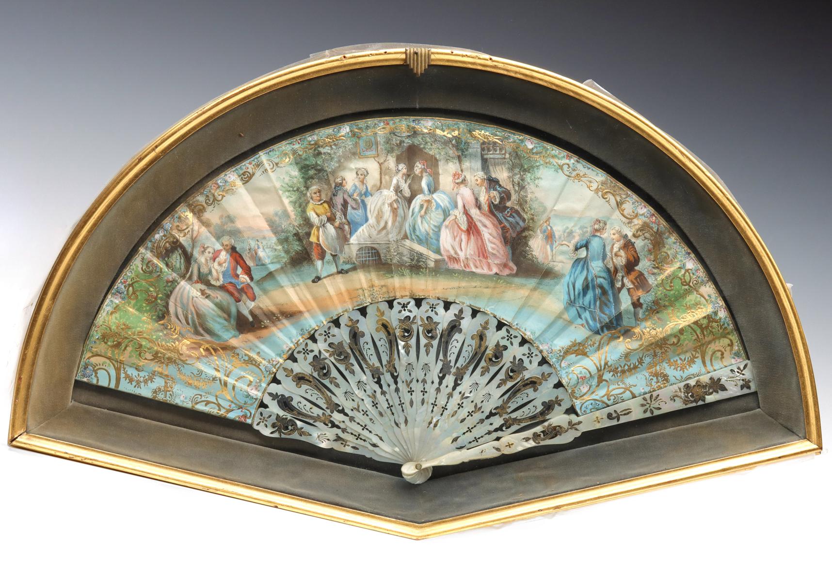 A VICTORIAN HAND FAN WITH MOTHER OF PEARL STICKS