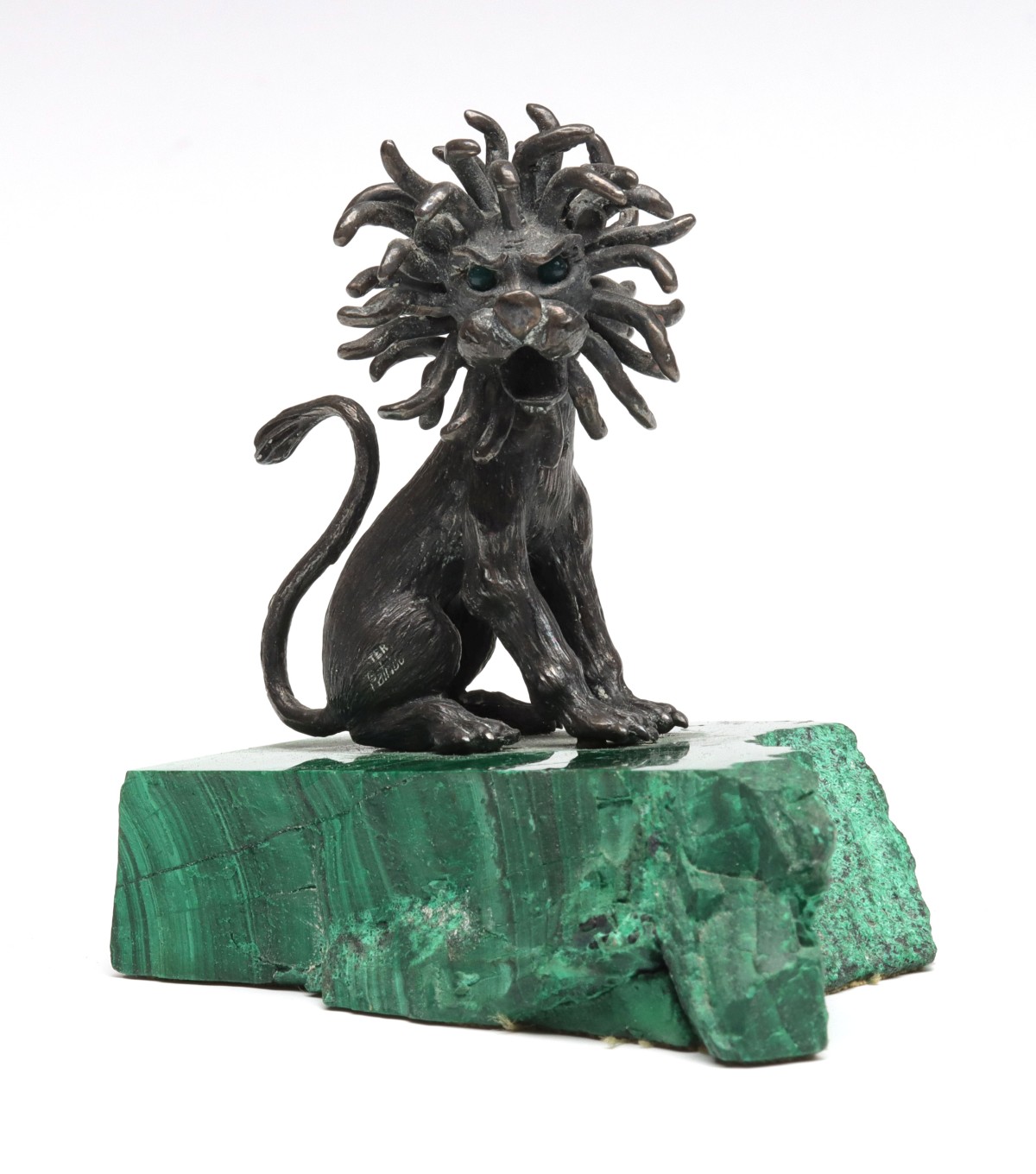 A JAMES SCHWAB STERLING SILVER AND MALACHITE SCULPTURE